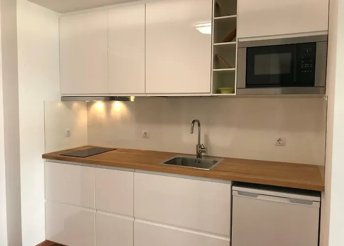 En La Isla Апартаменты *